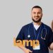Male nurse holding up a clock
